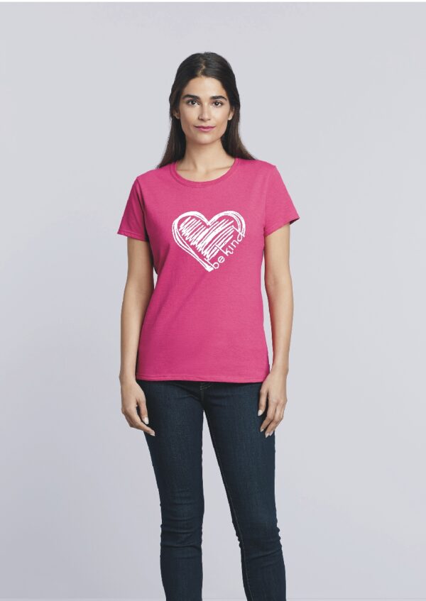 lady wearing "be kind" custom t-shirt with white stylized heart and text